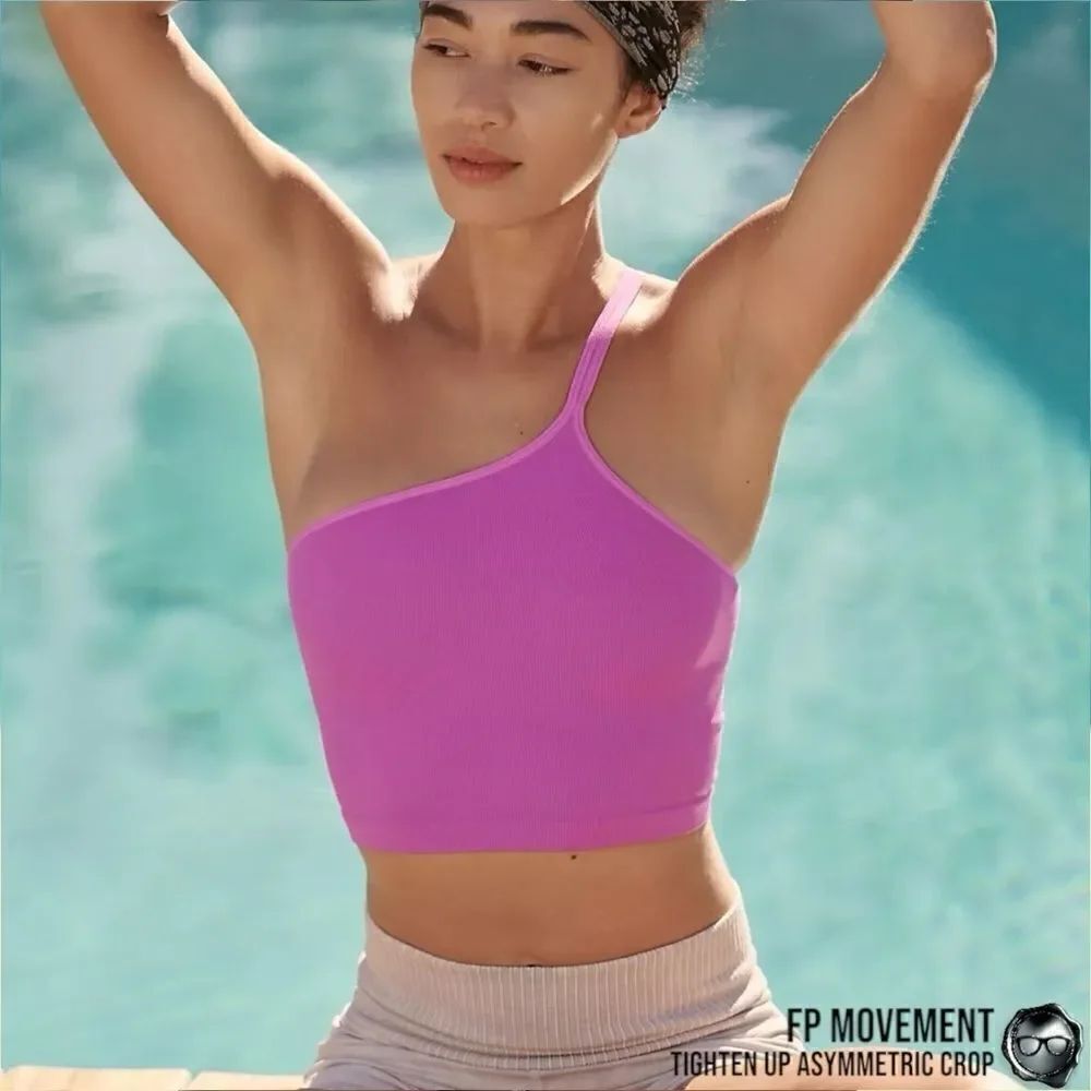 FP MOVEMENT TIGHTEN UP ASYMMETRIC CROP IN NEON MAGENTA ONE-SHOULDER TOP XS/S